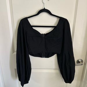 Woman’s long sleeve crop top with full zipper in back